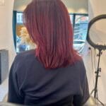 réalisation d'une coloration cheveux rouges