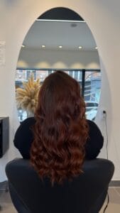 Cheveux roux cuivrés – coloration sur mesure et soin réparateur professionnel à Lille