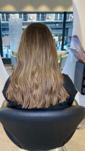 Balayage miel caramel sur cheveux longs – expertise coloriste à Lille